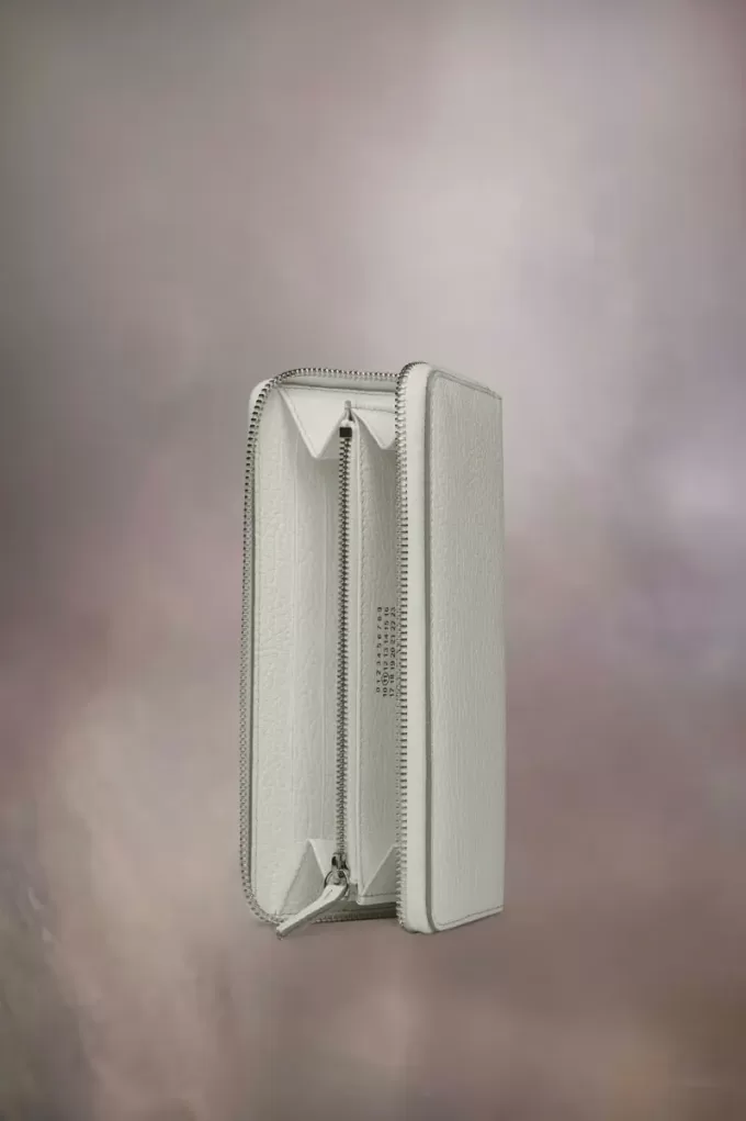 Cartera con cremallera de cuatro puntadas