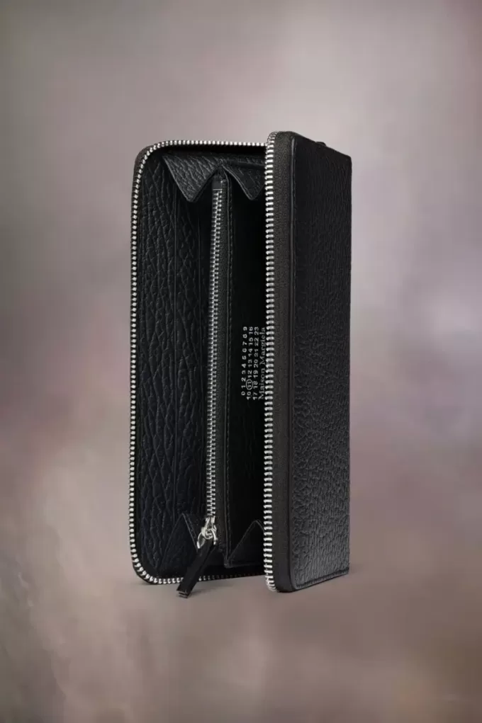 Cartera con cremallera de cuatro puntadas