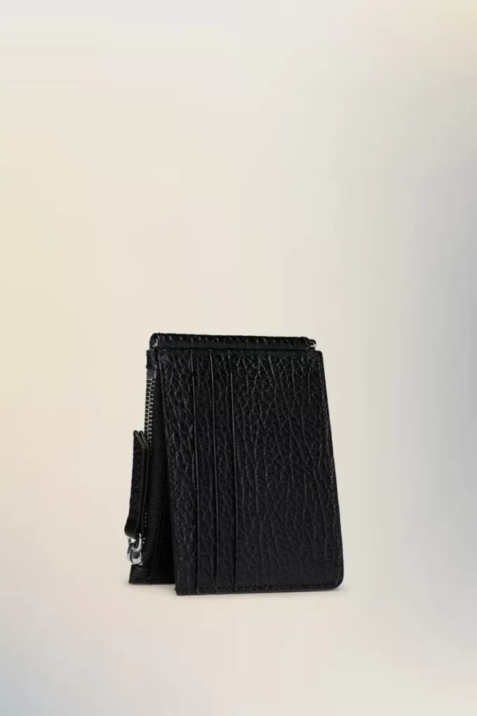 Cartera de cuatro puntadas