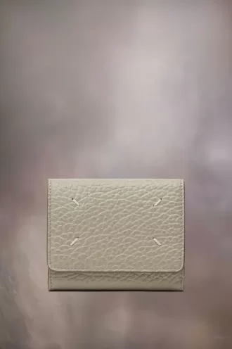 Cartera de cuatro puntadas