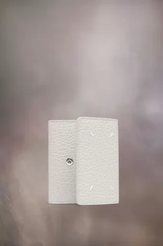 Cartera de cuatro puntadas Cartera de cuatro puntadas