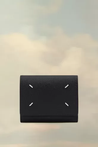 Cartera de cuatro puntadas