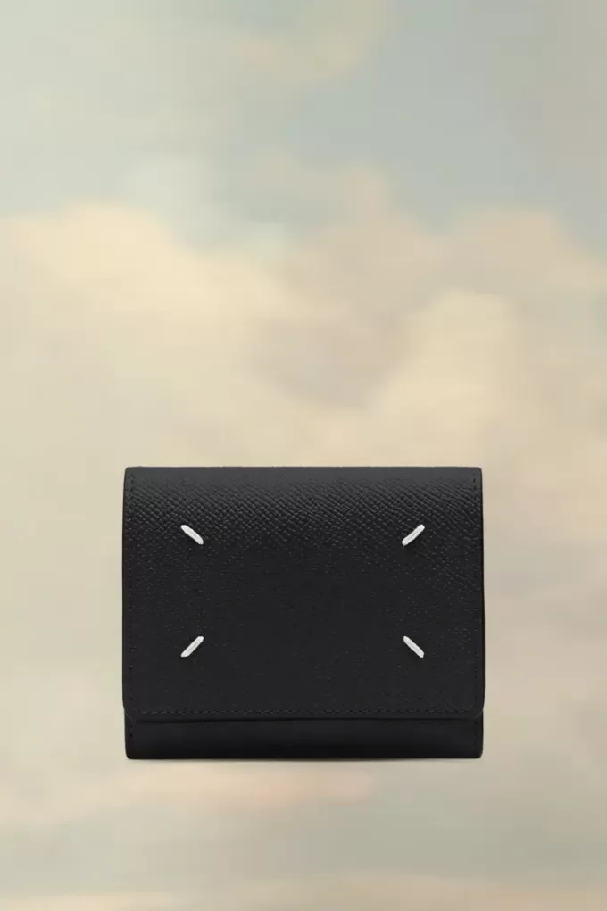 Cartera de cuatro puntadas