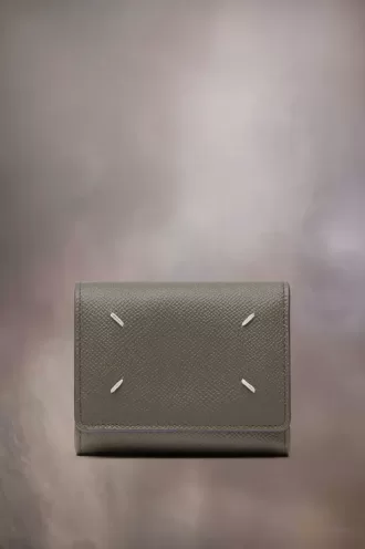 Cartera de cuatro puntadas