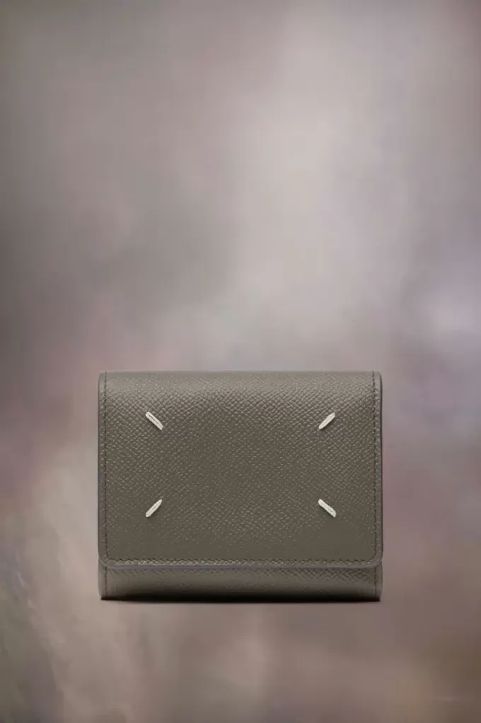 Cartera de cuatro puntadas