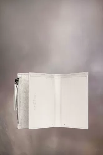 Cartera de cuatro puntadas