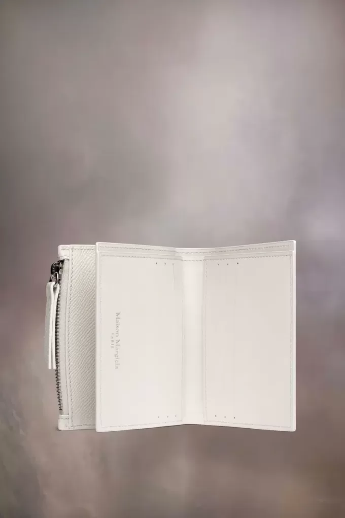 Cartera de cuatro puntadas