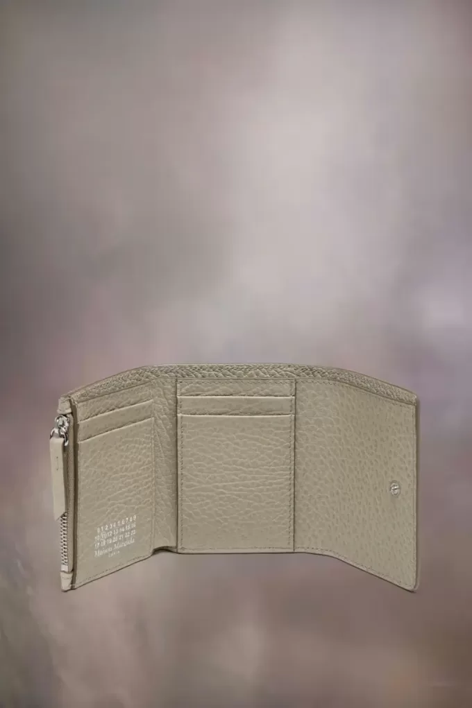 Cartera de cuatro puntadas Cartera de cuatro puntadas