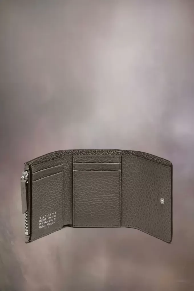 Cartera de cuatro puntadas