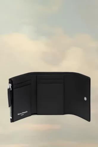 Cartera de cuatro puntadas