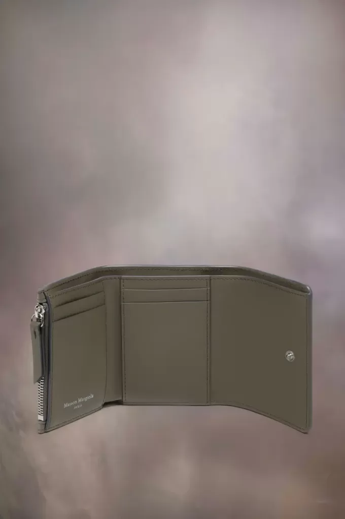 Cartera de cuatro puntadas