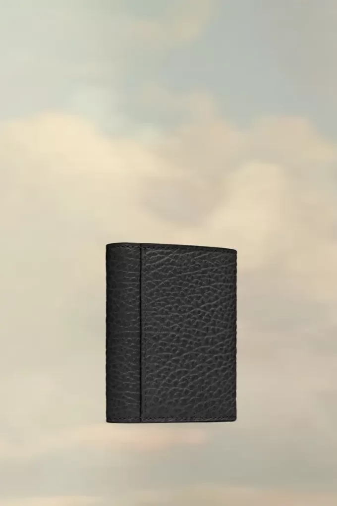 Cartera de cuatro puntadas