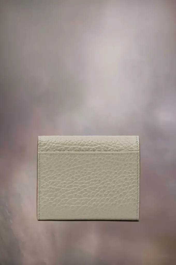 Cartera de cuatro puntadas Cartera de cuatro puntadas