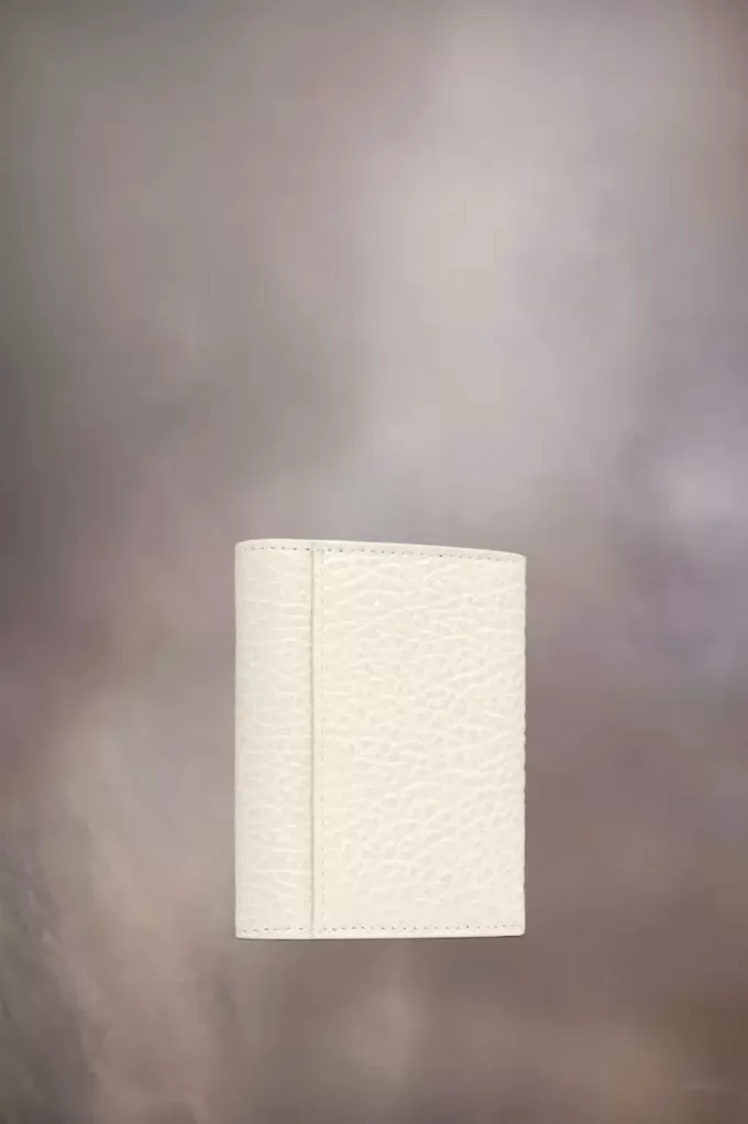 Cartera de cuatro puntadas