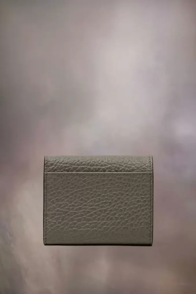 Cartera de cuatro puntadas