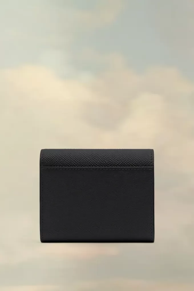 Cartera de cuatro puntadas