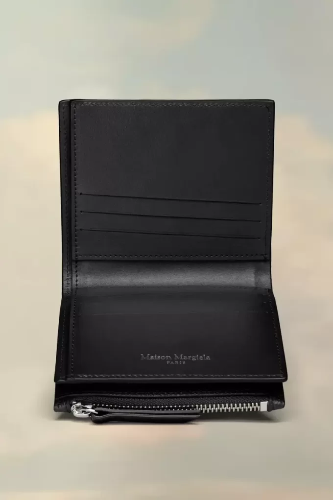 Cartera de cuatro puntadas