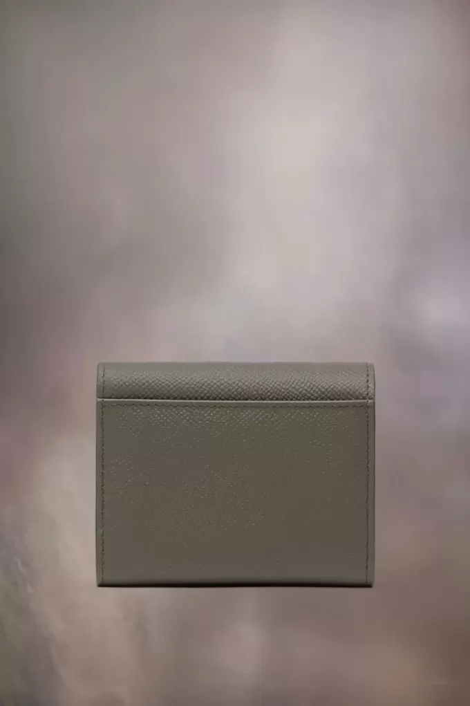 Cartera de cuatro puntadas