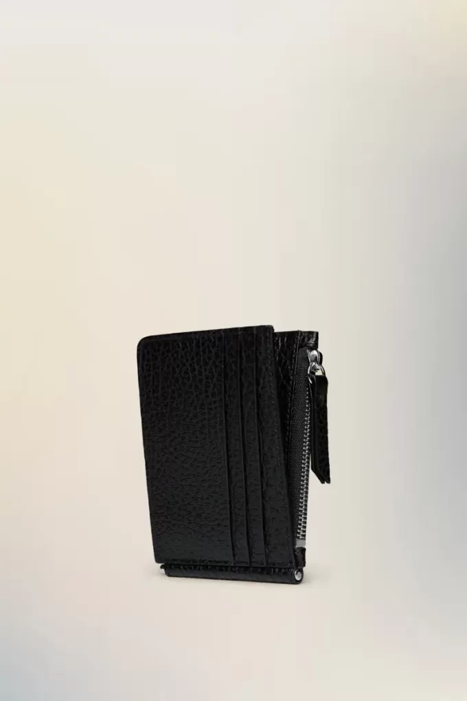 Cartera de cuatro puntadas