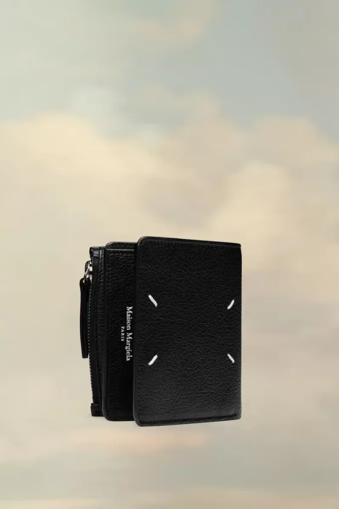 Cartera de cuatro puntadas