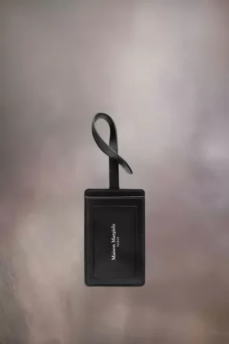 Etiqueta de equipaje de cuatro puntadas