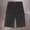 Pantalones cortos vaqueros con tachuelas de Maison Margiela Pantalones cortos vaqueros con tachuelas de Maison Margiela