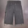 Pantalones cortos vaqueros con tachuelas de Maison Margiela