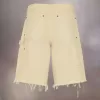 Pantalones cortos vaqueros con tachuelas de Maison Margiela