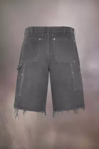 Pantalones cortos vaqueros con tachuelas de Maison Margiela Pantalones cortos vaqueros con tachuelas de Maison Margiela
