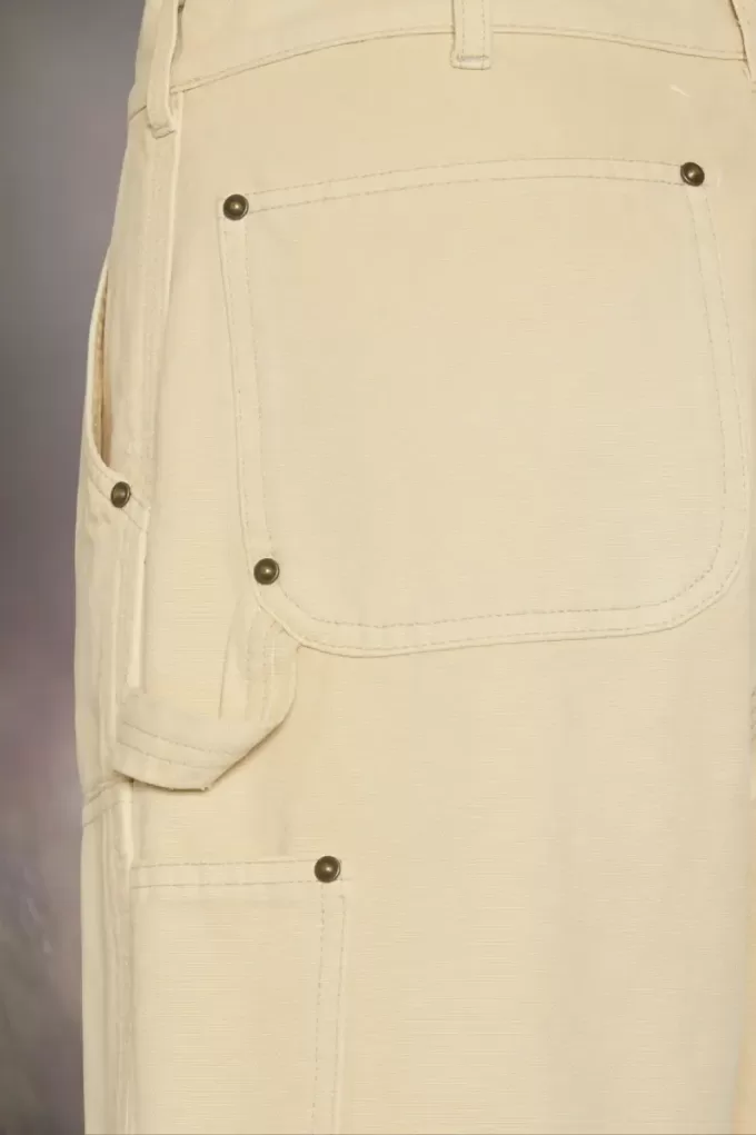 Pantalones cortos vaqueros con tachuelas de Maison Margiela