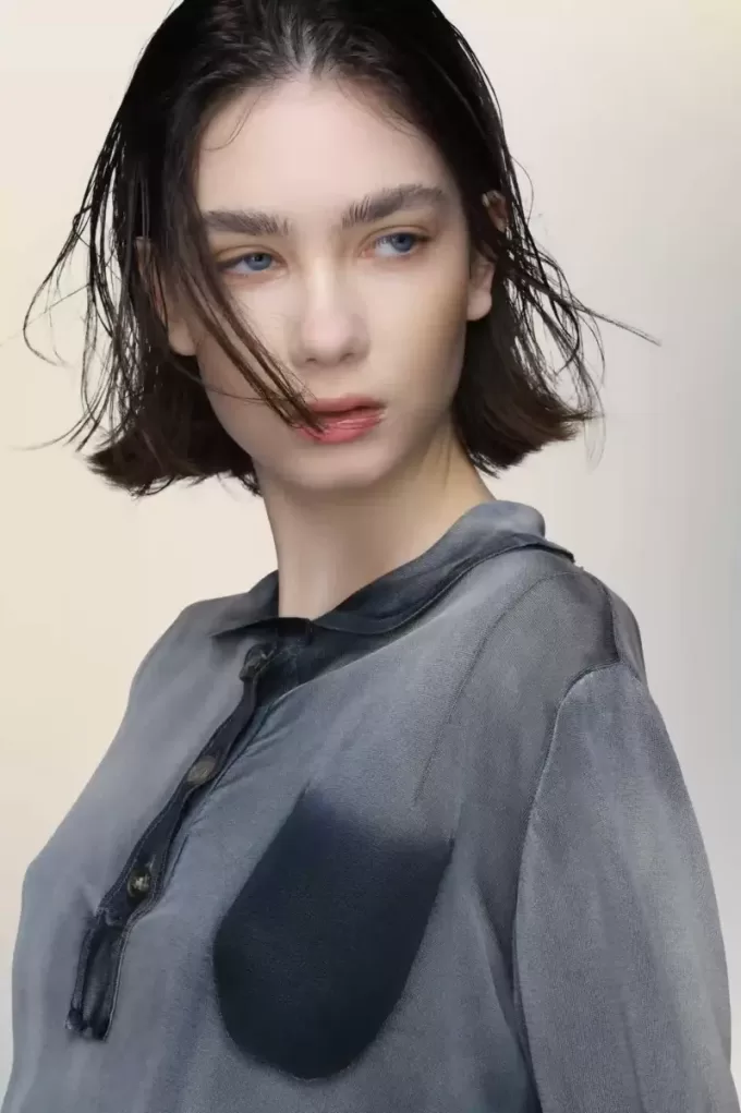 Polo desteñido por el sol de Maison Margiela