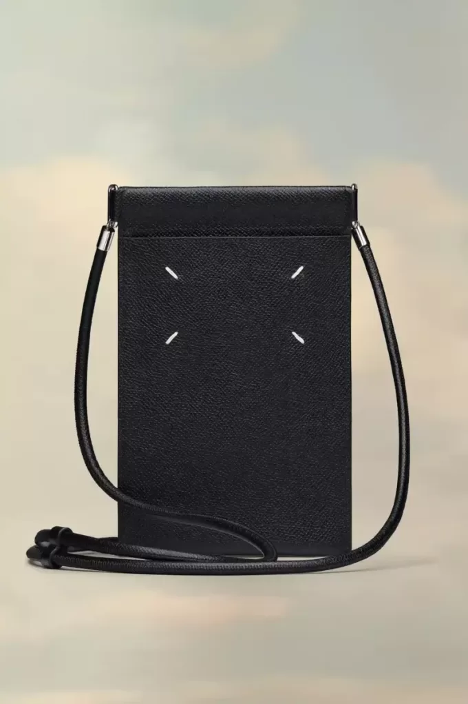 Soporte para teléfono con cuatro puntadas